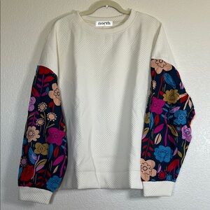 Cream textured top with floral sleeves, size 3X